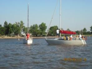 Kansas  - on Cheney Lake the find some 'heel time' for Summer Sailstice.