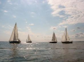 ND - Less wind but more sailors greeted the annual Lake Sakakawea Summer Sailstice celebreation.